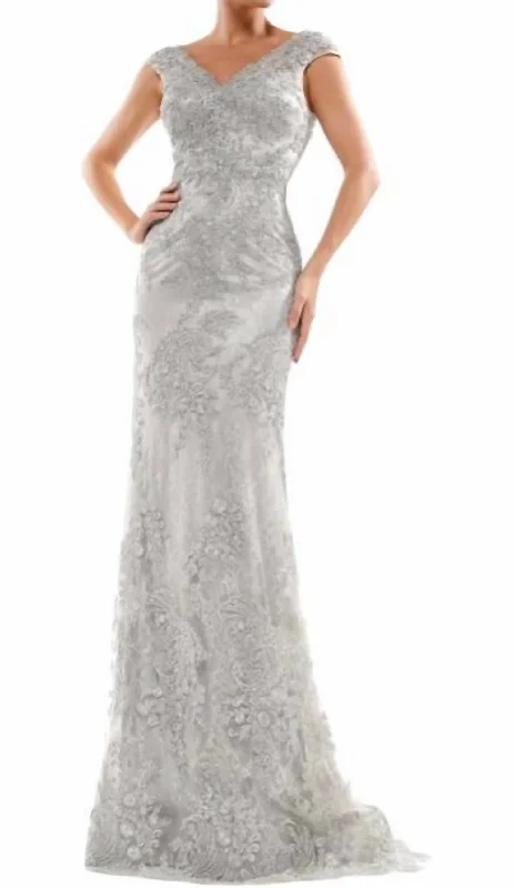 Should you go for a classic or trendy prom dress-Embellished Gown In Silver
