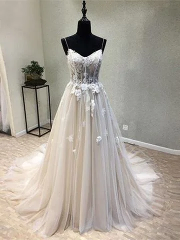 Choosing a wedding dress with a contemporary design-A-line Spaghetti Strap Chapel Train Tulle Appliqued Wedding Dresses With Flowers SWD033 Choosing a wedding dress with a contemporary design-A-line Spaghetti Strap Chapel Train Tulle Appliqued Wedding Dresses With Flowers SWD033