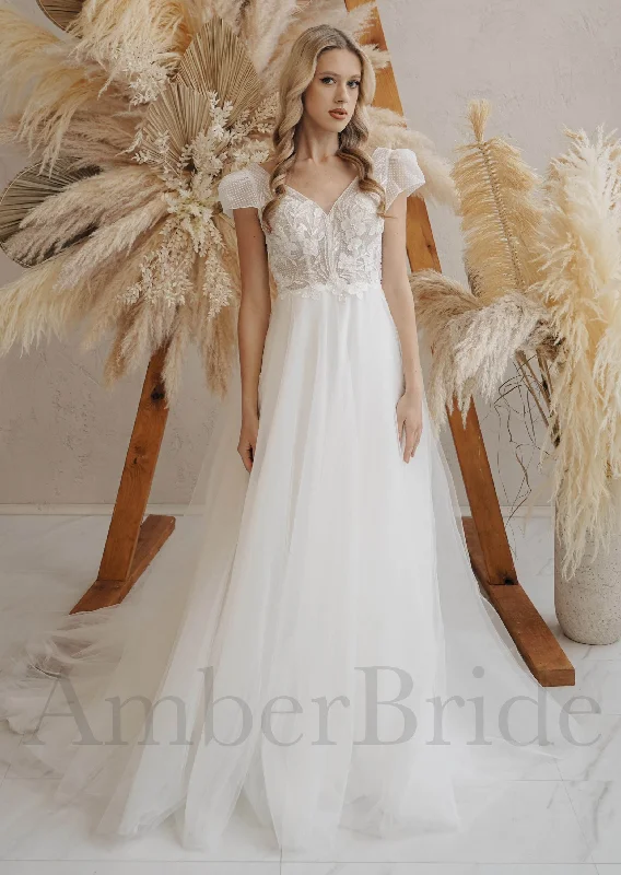 Best wedding dress colors for different skin tones-Boho A-Line Tulle Wedding Dress with V-Neck and Floral-Polka Dot Design Best wedding dress colors for different skin tones-Boho A-Line Tulle Wedding Dress with V-Neck and Floral-Polka Dot Design