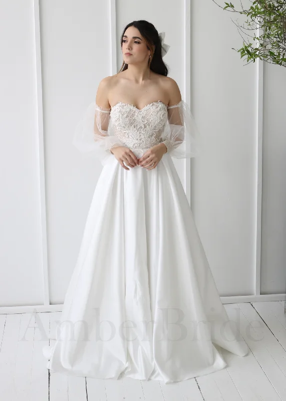 Wedding dresses for brides with hourglass figures-Boho A-Line Wedding Dress with Satin Skirt, Strapless Design, and Long Puffy Sleeves Wedding dresses for brides with hourglass figures-Boho A-Line Wedding Dress with Satin Skirt, Strapless Design, and Long Puffy Sleeves