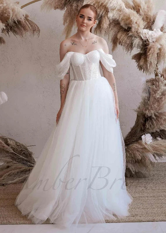 Wedding dresses for brides looking for a minimalist style-Exclusive A Line Tulle Wedding Dress with Glittery and Off Shoulder Design Wedding dresses for brides looking for a minimalist style-Exclusive A Line Tulle Wedding Dress with Glittery and Off Shoulder Design