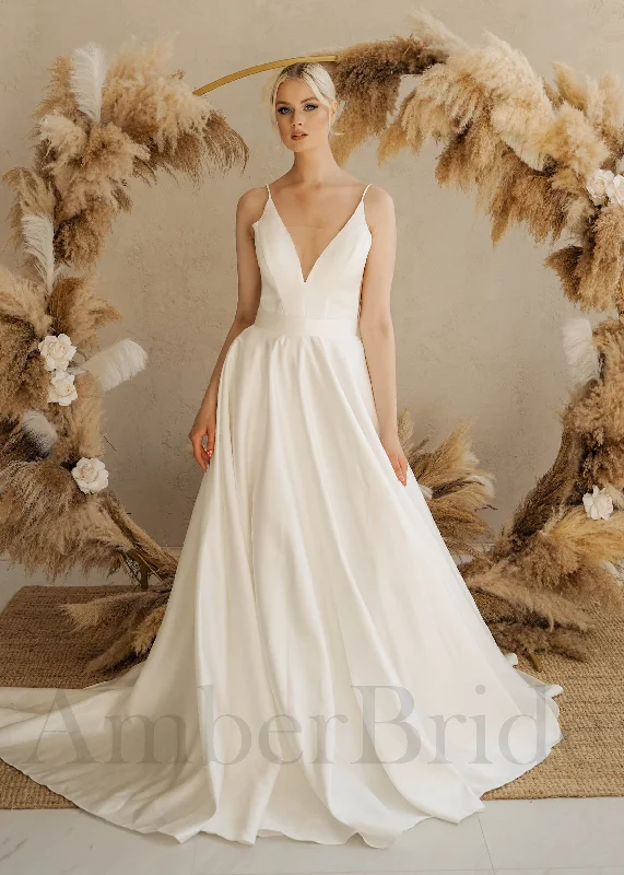 Best wedding dresses for a sophisticated bride-Minimalist A Line Satin Wedding Dress with Spaghetti Straps and Backless Design Best wedding dresses for a sophisticated bride-Minimalist A Line Satin Wedding Dress with Spaghetti Straps and Backless Design
