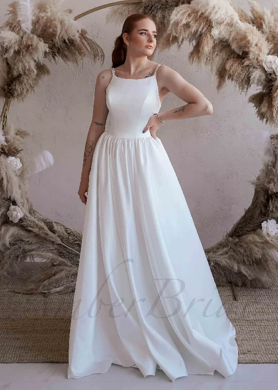 Where to find wedding dresses with lace embellishments-Minimalist Satin Wedding Dress with Spaghetti Straps and Backless Design Where to find wedding dresses with lace embellishments-Minimalist Satin Wedding Dress with Spaghetti Straps and Backless Design