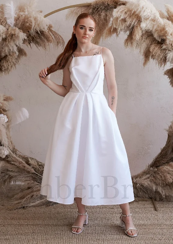 Wedding dresses with wrap-around designs for a slimming effect-Unique Tea Length Backless Wedding Reception Dress with Spaghetti Straps Wedding dresses with wrap-around designs for a slimming effect-Unique Tea Length Backless Wedding Reception Dress with Spaghetti Straps